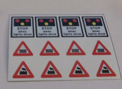 Self adhesive stickers for level crossing signs
